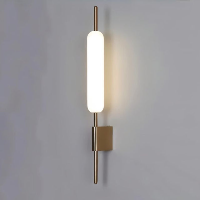 "Modern wall lamp with a cylindrical glass diffuser and iron frame, ideal for bathroom lighting."