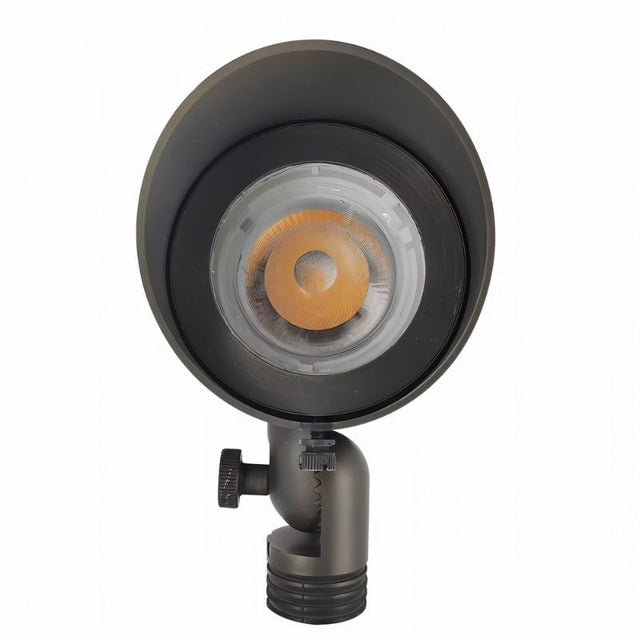 "Front view of an outdoor spotlight with LED light, adjustable features, and die-cast brass construction."