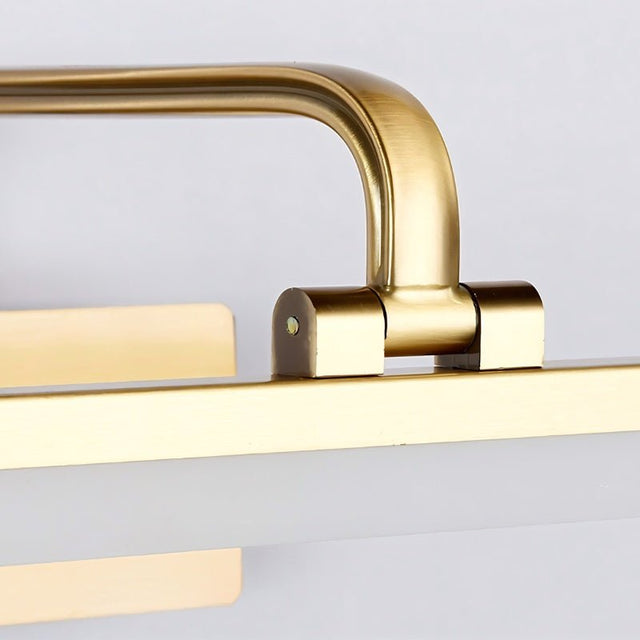 "A close-up of a gold-finish LED vanity light, showcasing its sophisticated design and high-quality construction."