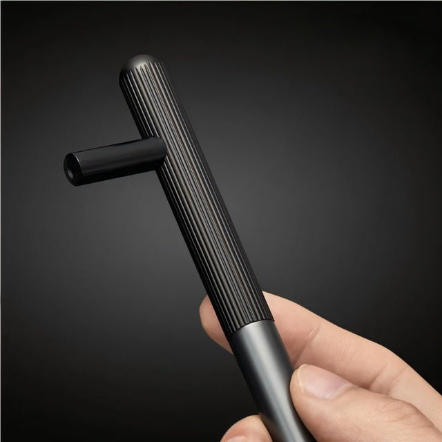 "Close-up of a minimalist aluminum knob and pull bar with a sleek cylindrical design and textured grip."