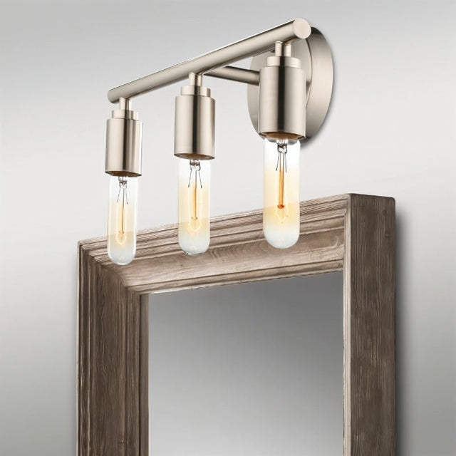"Brushed nickel 3-light industrial wall sconce with a minimalist design above a mirror."