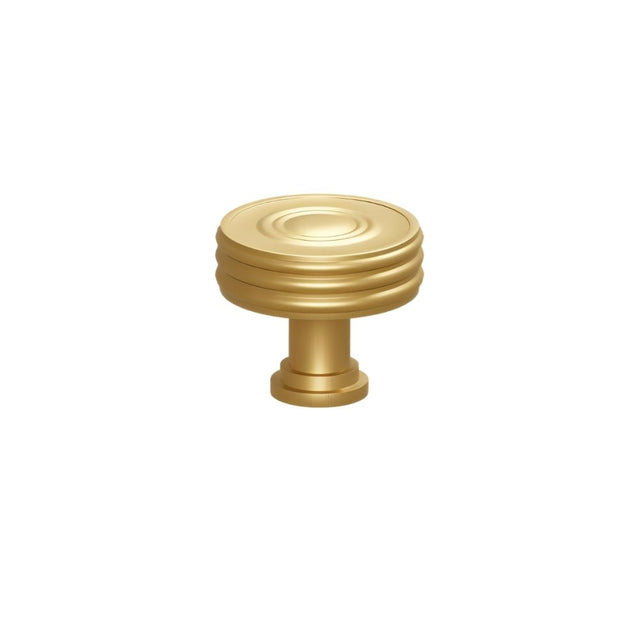 "Solid brass round knob with a grooved design, suitable for cabinets, wardrobes, or vanities."