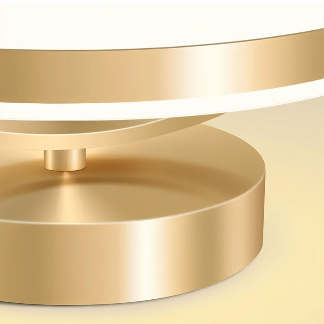 "Close-up detail of a modern ceiling light showing gold finish and layered ring structure."