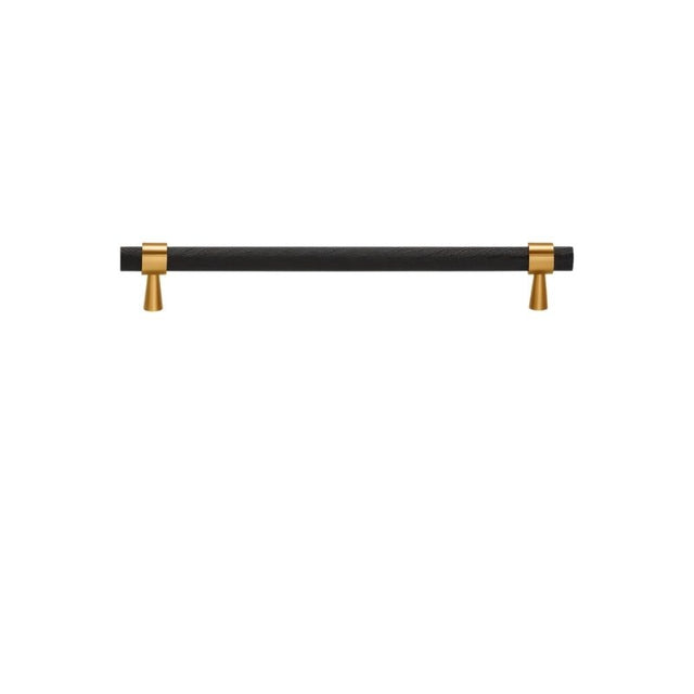 "A sleek black pull bar handle with gold accents on the mounts."