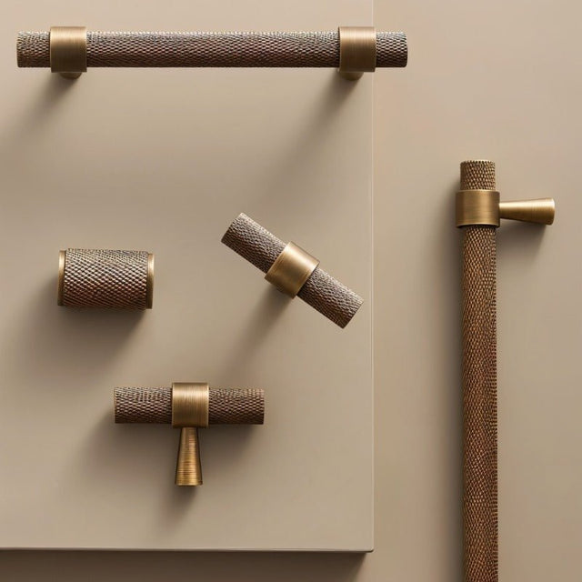"Set of precision-crafted brass knurled pull bar handles with a cylindrical shape and sleek metallic finish."