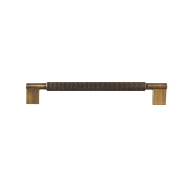"A knurled brass pull bar with clean edges, blending industrial design and functionality for modern spaces."