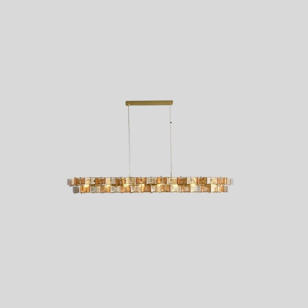 "Isolated iron Salane chandelier with layered amber glass elements on a light grey background."