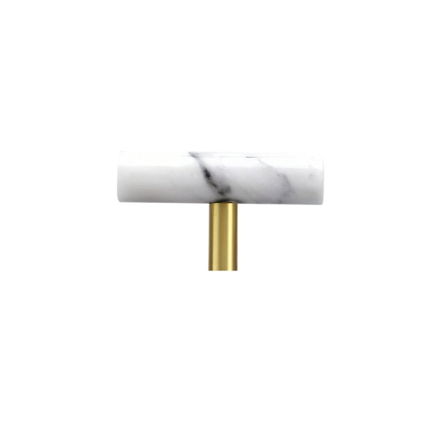 "A white marble knob with a polished brass stem, suitable for cabinets and drawers."
