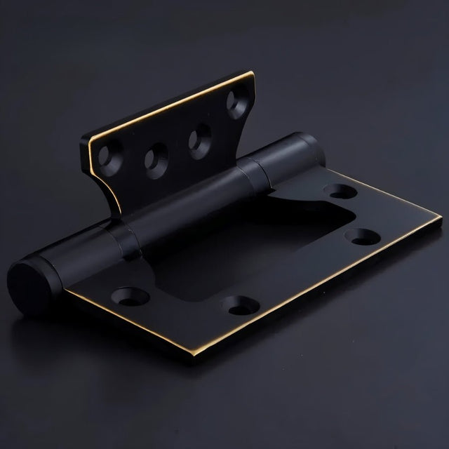 "A black brass door hinge with gold trim, featuring a reinforced design and multiple screw holes, shown on a dark background."