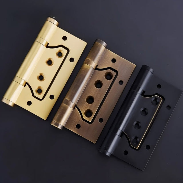 "Three brass door hinges in gold, bronze, and black finishes, shown on a dark background."
