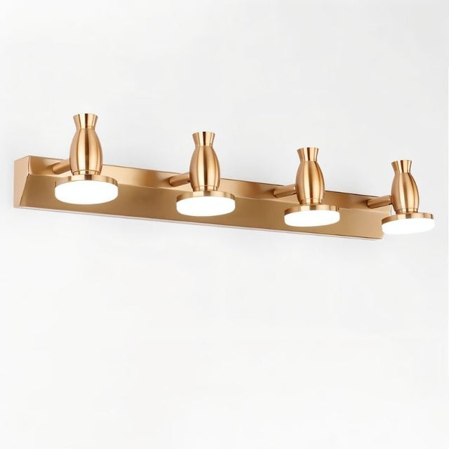 "A modern, 4-head vanity light in a brushed gold finish, showcasing its sleek design."