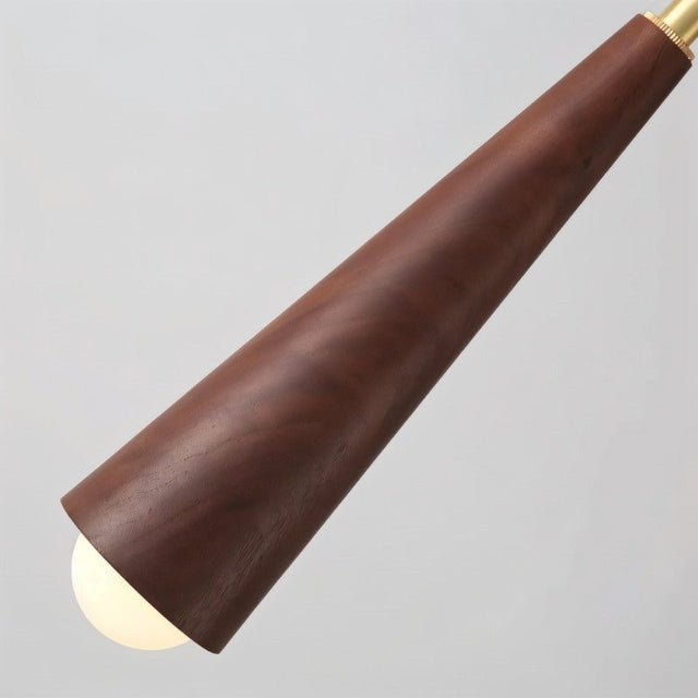 "A modern pendant light with a conical walnut wood shade and copper detailing."