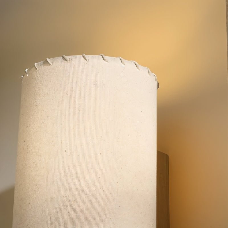 "Close-up view of the Svetlina floor lamp’s fabric lampshade, showcasing the high-quality fabric and elegant stitching details."