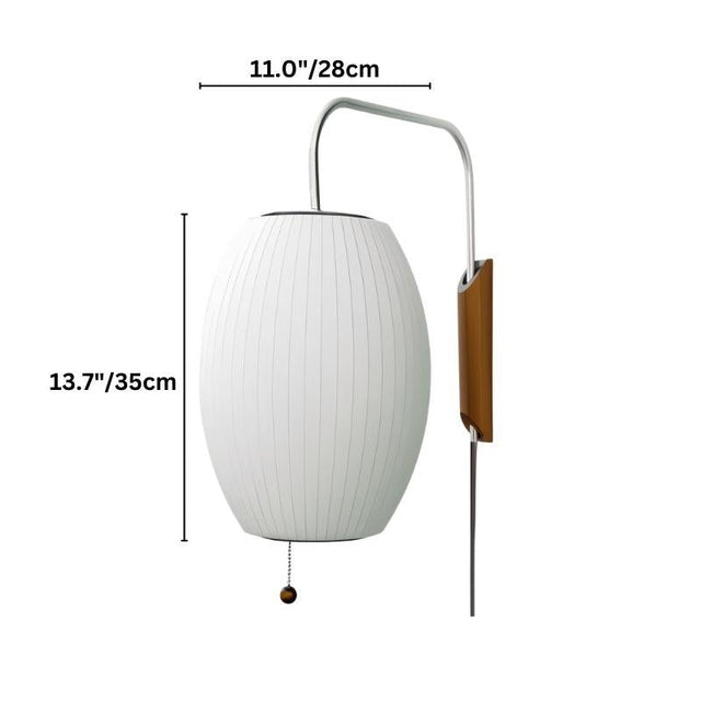 "A stylish, contemporary wall lamp featuring a luxurious silk shade for a soft, ambient light."