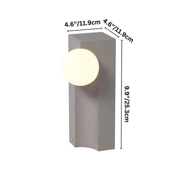 Small Teral Table Lamp with dimensions 9.9 x 4.6 inches, featuring concrete base and glowing glass globe for compact ambient lighting.