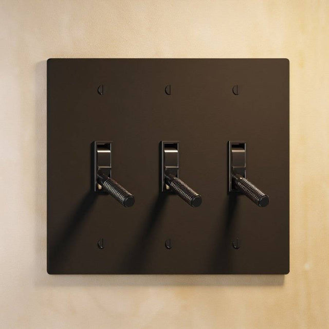 Triple gang The Brass Toggle Switch (1 to 5 Gang) - Open Box in antique bronze with gold toggles, ideal for traditional home lighting.