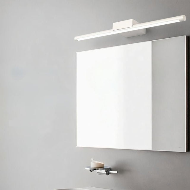 "Modern wall lamp providing uniform illumination above a bathroom vanity mirror."