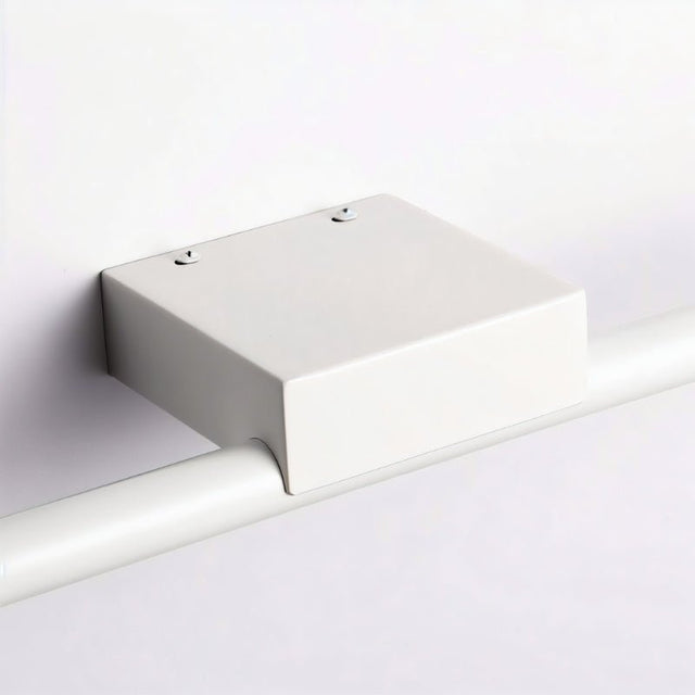 "Close-up of the Tovian wall lamp mount, showing its minimalist design and secure attachment."