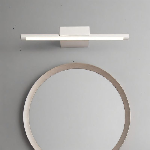 "Modern wall lamp with minimalist design above a round bathroom mirror, providing uniform illumination."