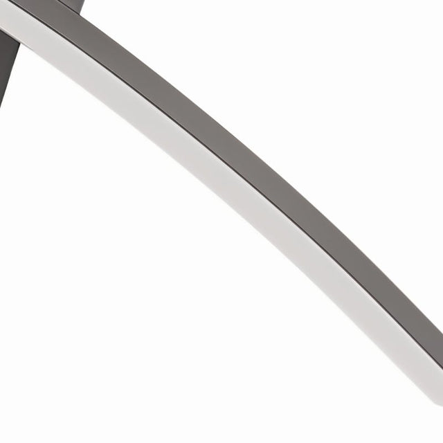 "A close-up view of the Walt curved LED wall lamp, showcasing its material and finish detail."