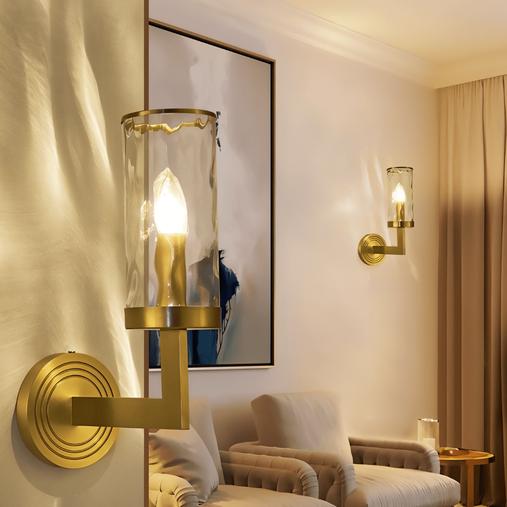 Pair of Wynlo Copper Walllamps illuminating a cozy living room with beige seating and contemporary wall art, enhancing ambient lighting.