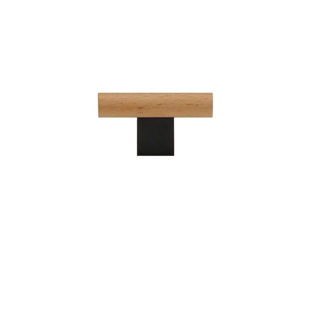 "A minimalist wood and black knob, combining natural finishes with modern design, isolated on a white background."