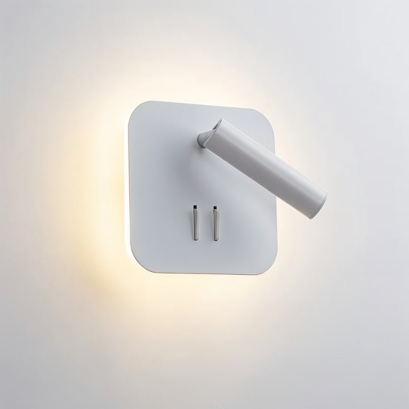 "A modern white square wall-mounted reading lamp with a circular backplate and adjustable cylindrical spotlight, showcasing its minimalist design and ambient lighting."
