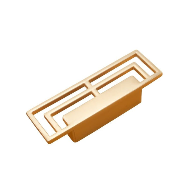 "A brushed gold, geometric pull bar with bold cutouts, made of zinc alloy, isolated on a white background."