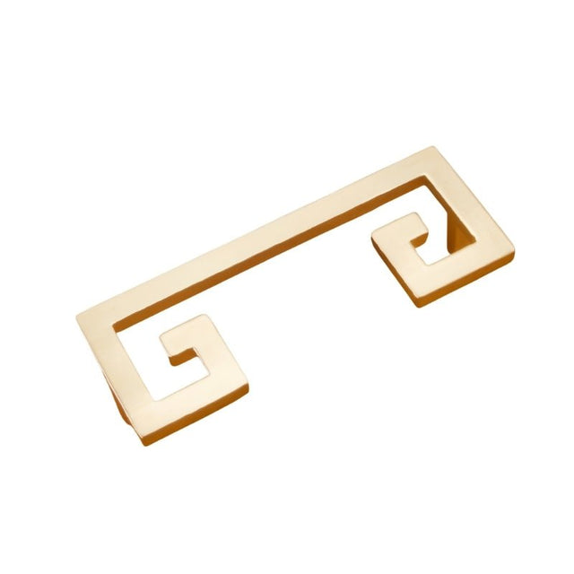 "A brushed gold, geometric pull bar with bold cutouts made of zinc alloy, isolated on a white background."