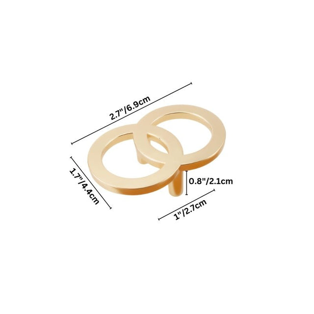 "A brushed gold, geometric knob with sharp, angular edges, made of zinc alloy, shown with dimensions."