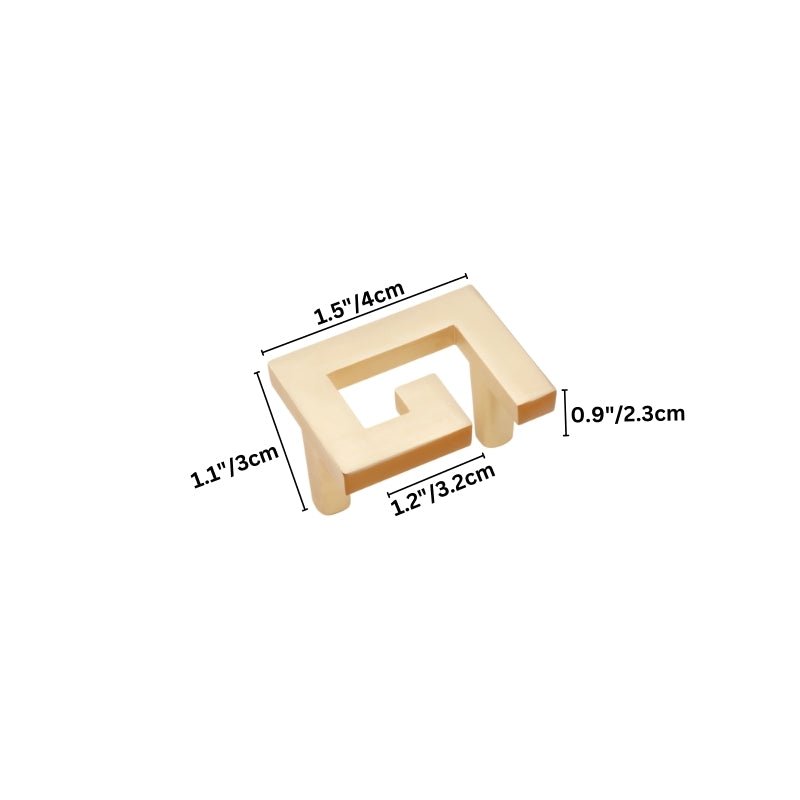 "A brushed gold, geometric knob with sharp, angular edges, made of zinc alloy, shown with dimensions."