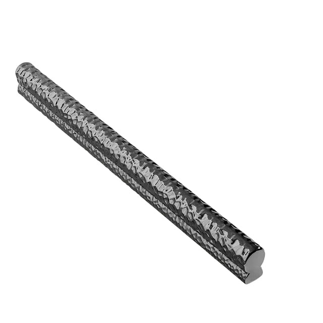 "Gunmetal hammered texture pull bar handle isolated on a white background, showcasing its modern and handcrafted design."