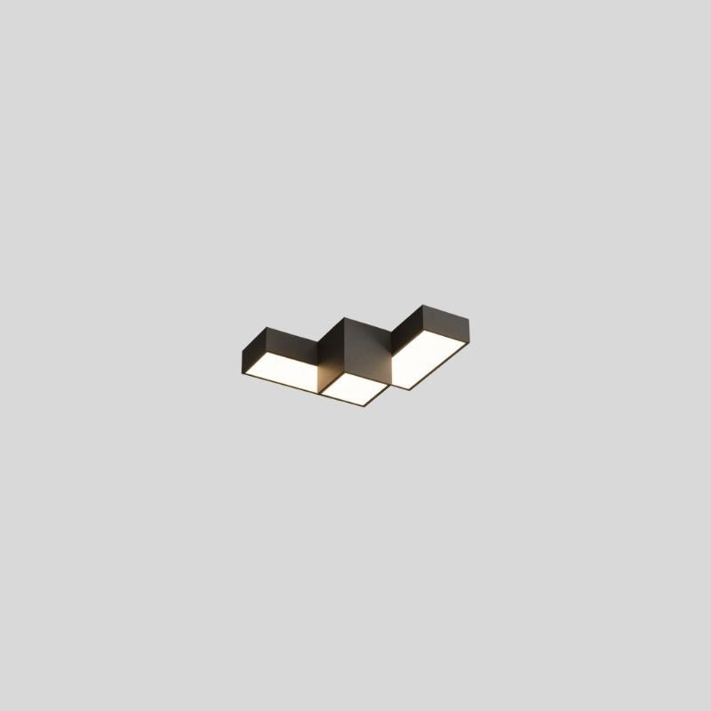 "A geometric ceiling light with interlocking rectangular forms, isolated against a neutral background, showcasing its minimalist design."
