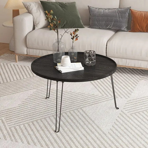 The Anake Coffee Table is a sleek and modern addition to your living space, boasting clean lines and contemporary design.