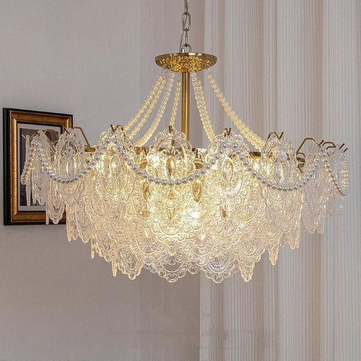 Introducing the Bariq Glass Chandelier: a stunning and elegant lighting fixture that adds a touch of luxury to any space.