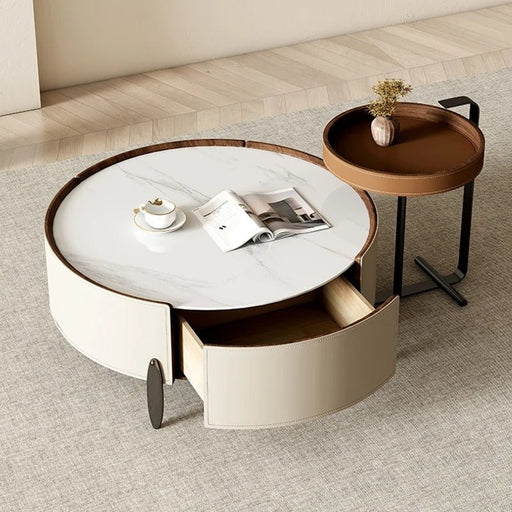 The Biculo Coffee Table boasts a sleek and modern design with its minimalist silhouette and clean lines, making it a stylish addition to any living room.