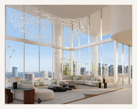 Rendering of a double-height Fouquet's Miami living room with a glass chandelier and floor-to-ceiling skyline and bay views.