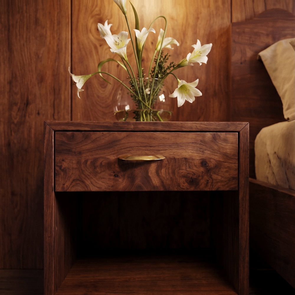 Enzo Cabinet Pull in Satin Brass, installed in a bedroom