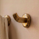 Enzo Wall Hook in Satin Brass, close-up detail