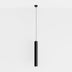 Pendant light with a cylindrical shape and black finish, suspended from the ceiling by a thin cord, minimalistic design.