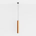 Copper cylindrical pendant light hanging from a black ceiling mount against a white background.