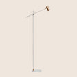 "Contemporary steel floor lamp with a white finish and adjustable arm"