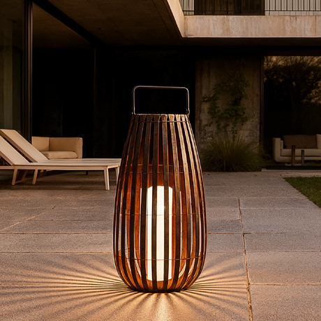 Benjiro Outdoor Floor Lamp casting a warm glow on a patio
