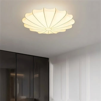 "Elegant ceiling light made of silk and iron in a modern bedroom"