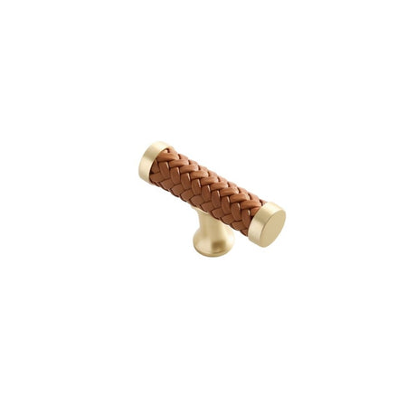 "Brown braided leather knob with gold accents, isolated on a white background."