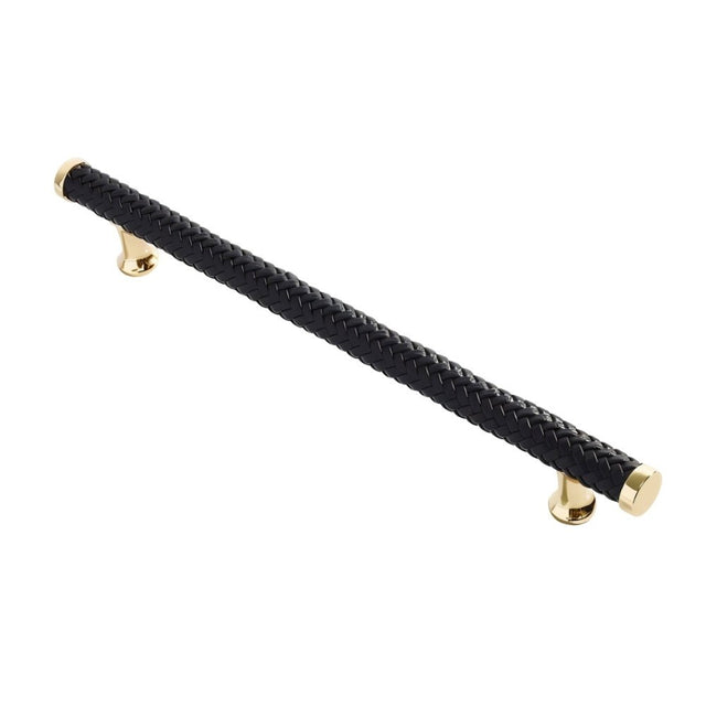 "Black braided leather pull bar handle with gold accents, isolated on a white background."