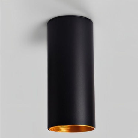 "Stylish modern bedroom illuminated by sleek ceiling lights with a focused downward glow, ideal for contemporary spaces."