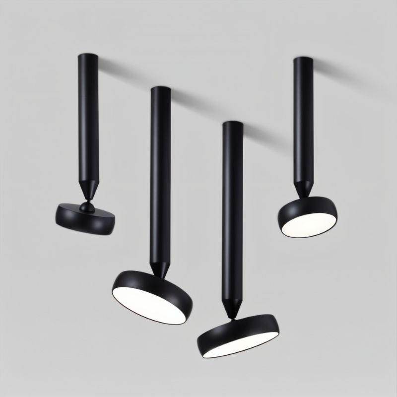 "Cluster of black ceiling-mounted lights with adjustable heads, cylindrical design, and durable aluminum material, industrial style."