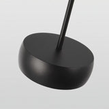 "Close-up of black aluminum pendant light canopy, sleek cylindrical design, minimalistic finish"