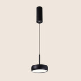 "Side view of black pendant light, cylindrical aluminum canopy, clean contemporary design"